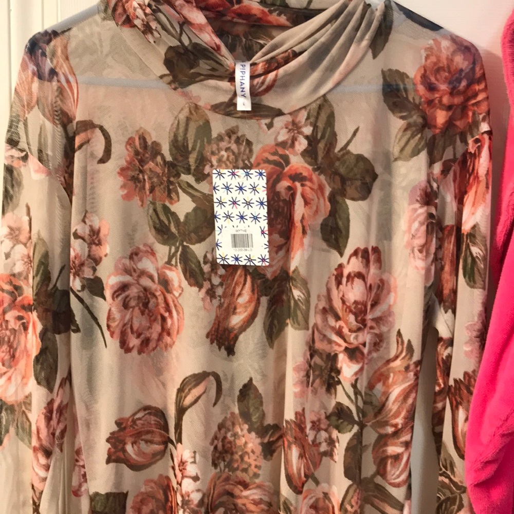 Beautiful floral sheer top.
